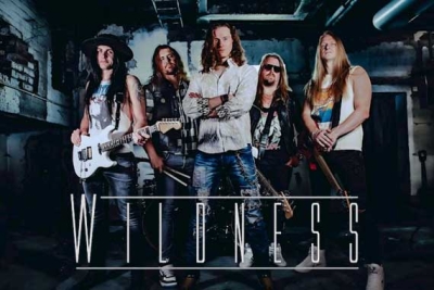 WILDNESS zurück mit neuem Album «Avenger» im Januar '25. Erstes Video &amp; Single zu «Crucified» veröffentlicht